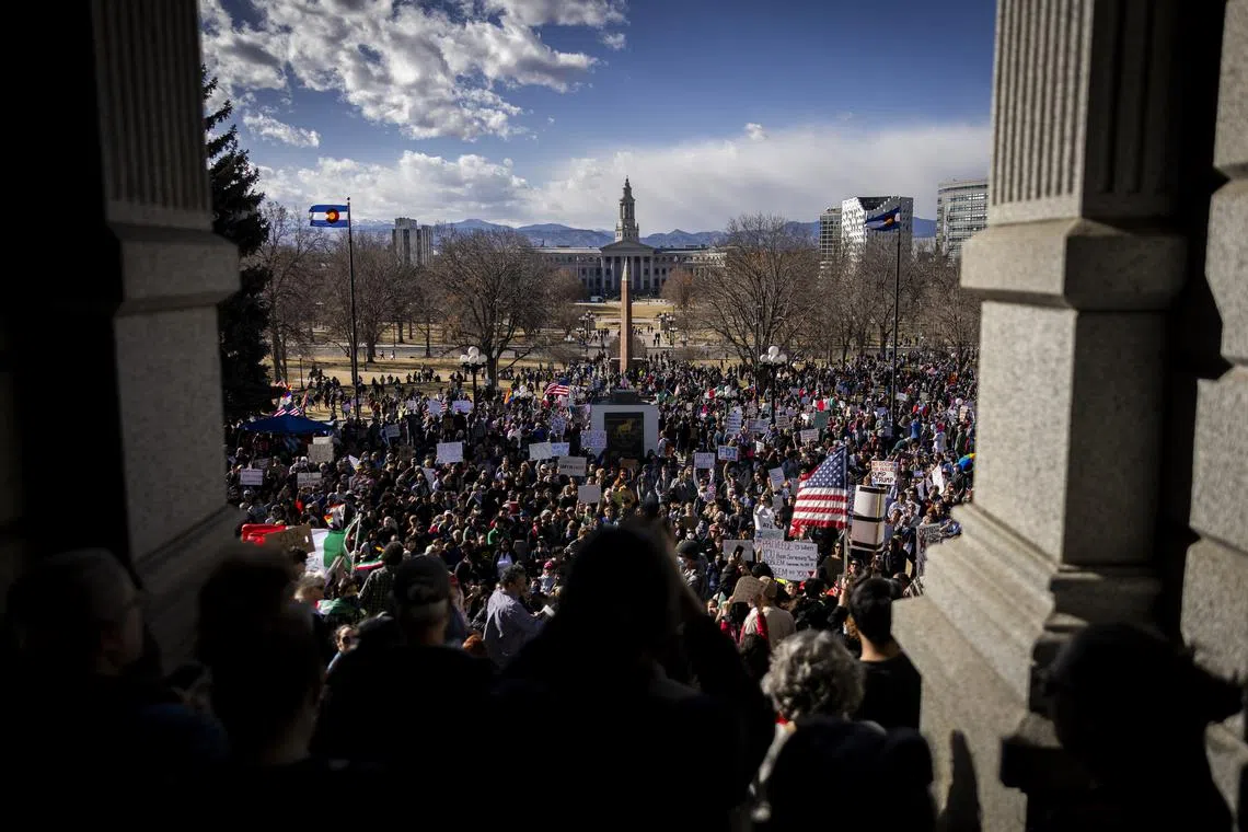 Protesters during a demonstration against US President Donald Trump at the Colorado State Capitol in Denver, on Feb. 5.