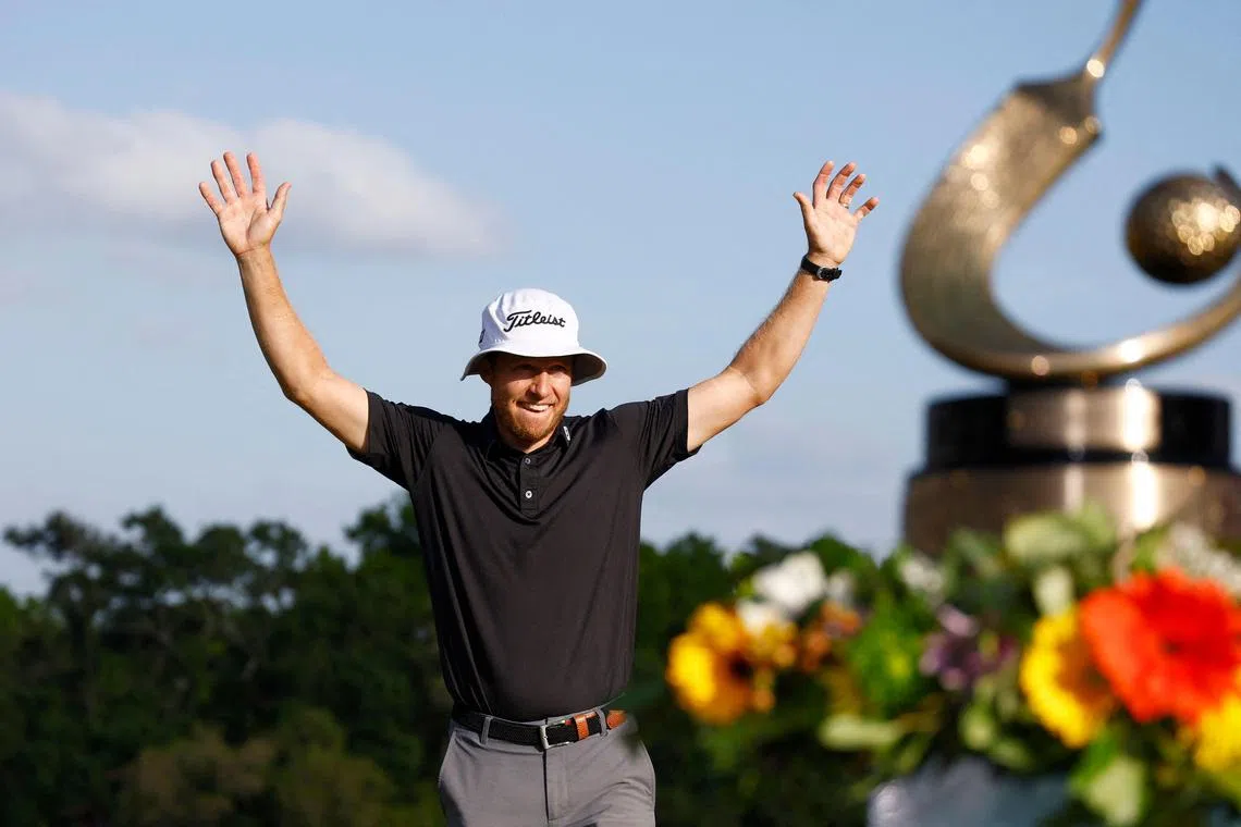 Peter Malnati accepting the Valspar Championship Trophy after the final round of the Valspar Championship.