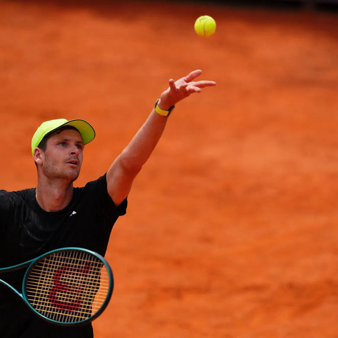 FILE PHOTO: Tennis - Italian Open - Foro Italico, Rome, Italy - May 15, 2025 Poland's Hubert Hurkacz in action during his quarter final match against Tommy Paul of the U.S. REUTERS/Aleksandra Szmigiel/File Photo