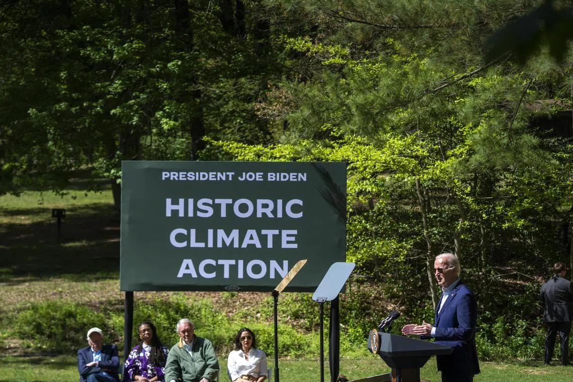 epa11294795 US President Joe Biden delivers remarks to commemorate Earth Day at an event in Prince William Forest Park in Triangle, Virginia, USA, 22 April 2024. President Biden announced 7 billion USD in grants for residential solar projects.  EPA-EFE/SHAWN THEW / POOL