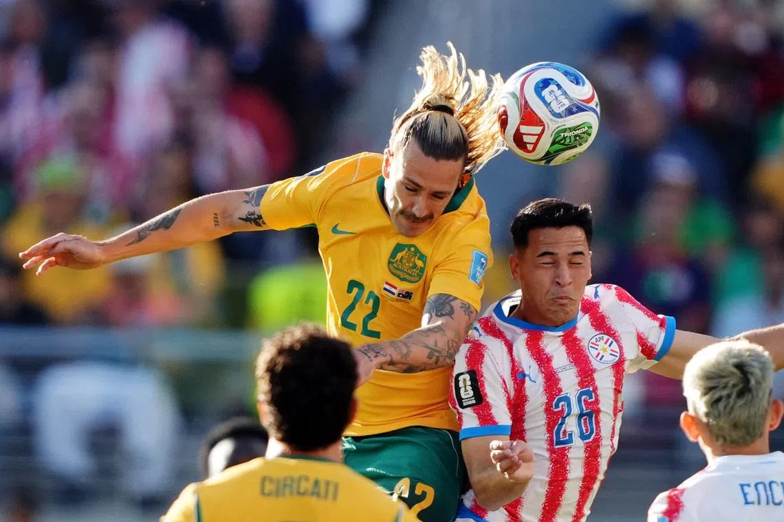 Australia’s Jackson Irvine in action with Paraguay’s Alexandro Maidana in the 0-0 draw in San Francisco.