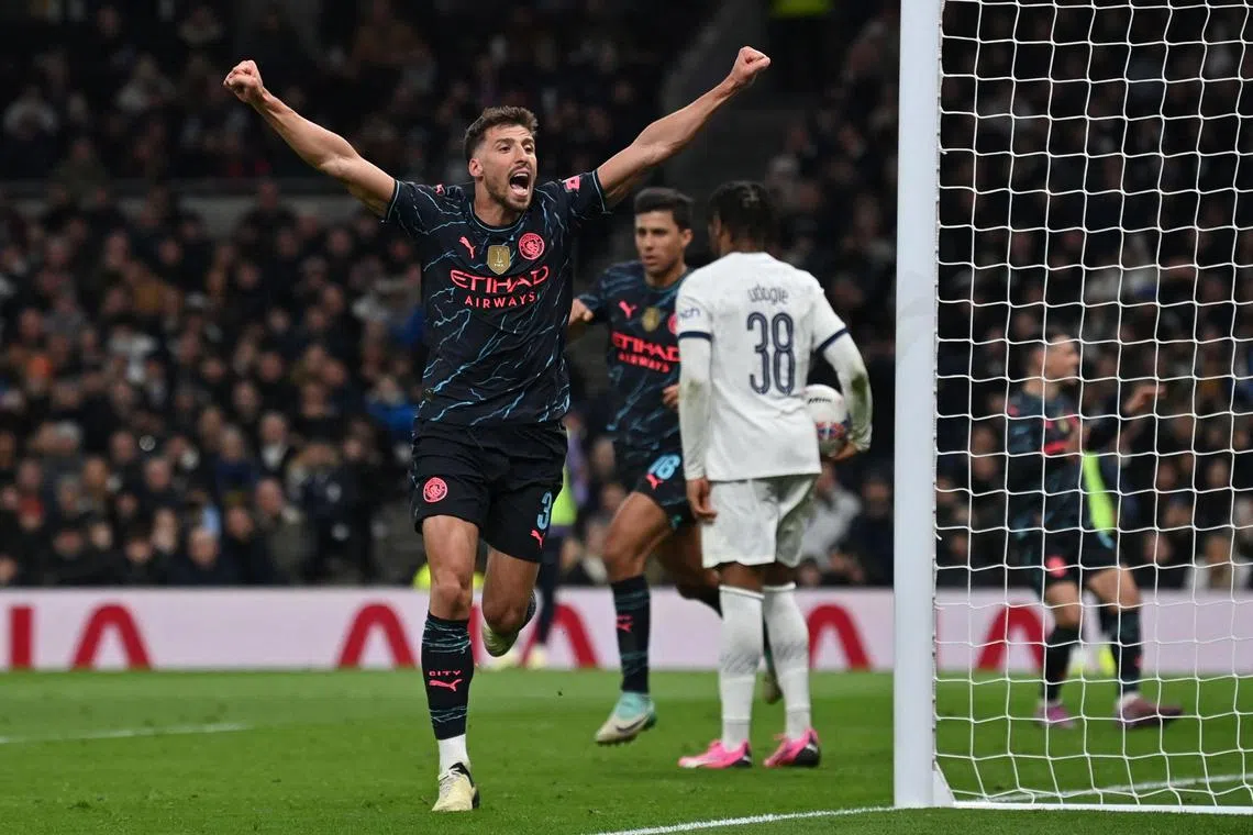 Manchester City's Portuguese defender Ruben Dias celebrating their winner during the 1-0 English FA Cup fourth-round football triumph over Tottenham Hotspur at the Tottenham Hotspur Stadium in London on Jan 26.