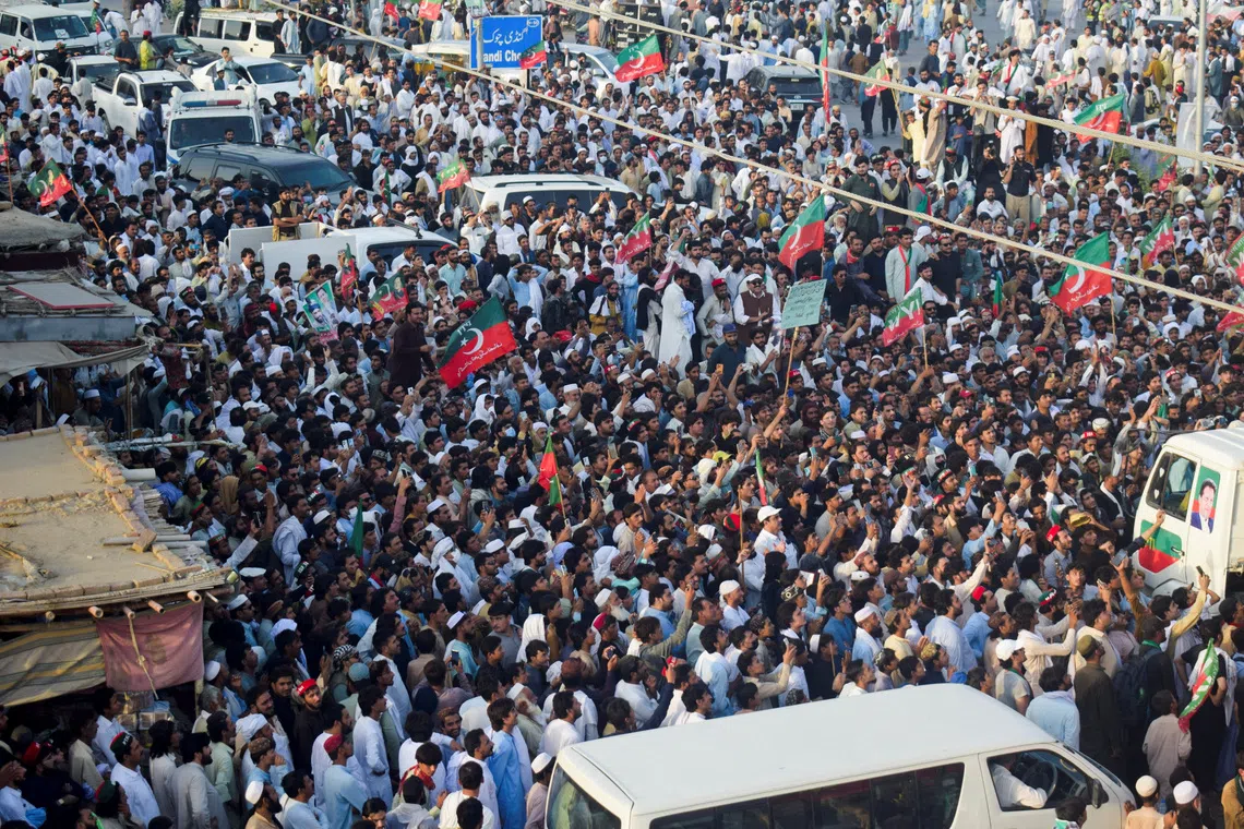 Thousands of Imran Khan supporters start march to Pakistani capital, party says