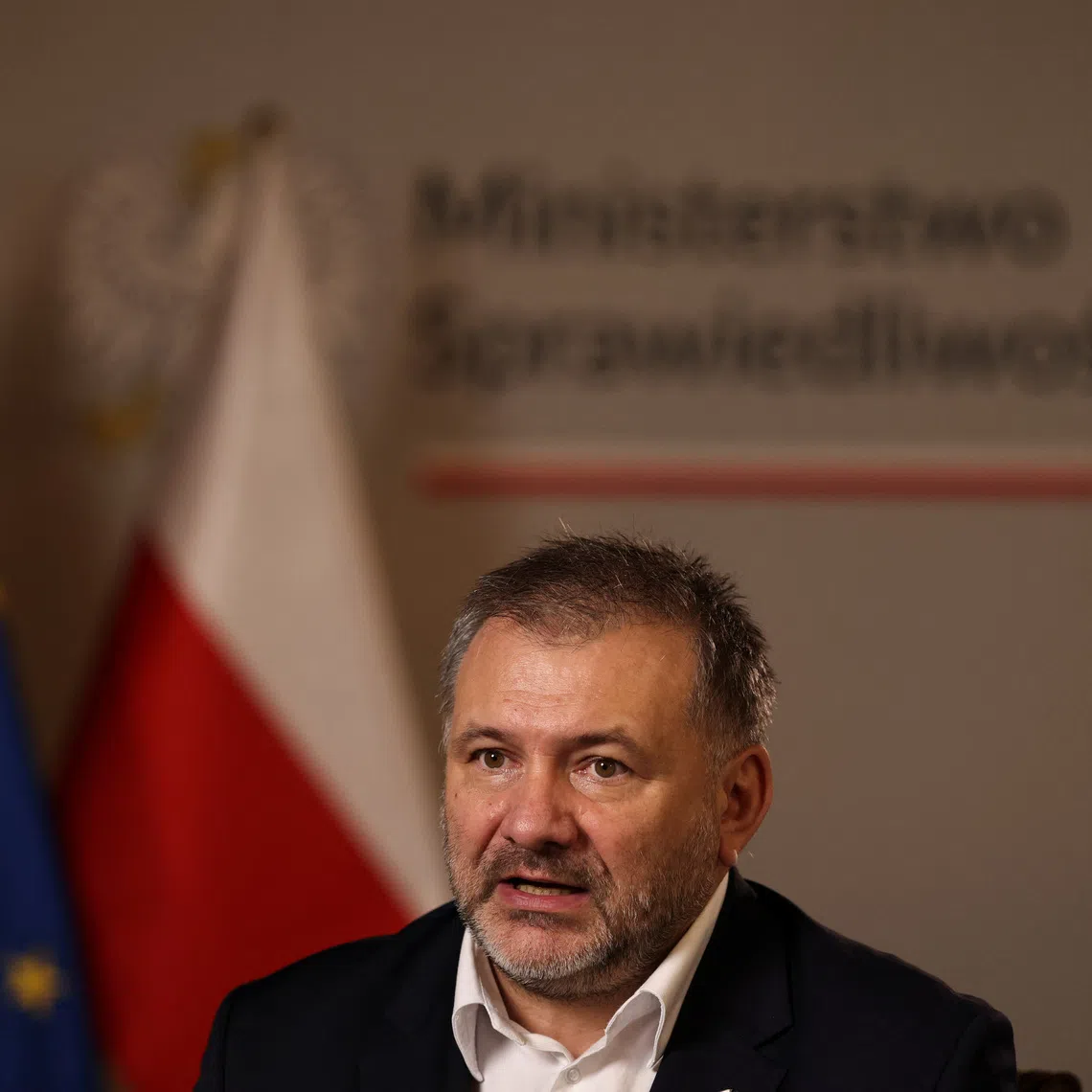 Polish Justice Minister Waldemar Zurek speaks during an interview with Reuters in Warsaw, Poland, December 11, 2025. REUTERS/Kuba Stezycki
