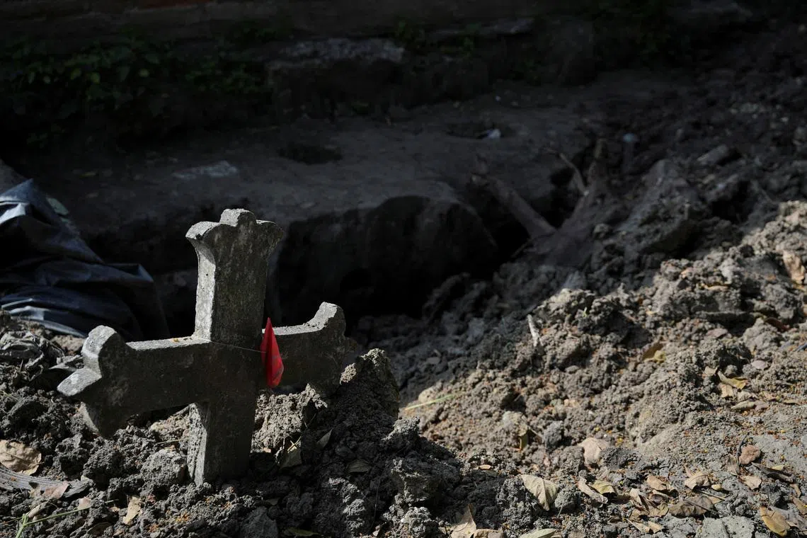 A grave cross is seen in the area where ossuaries are being built, on the day of a commemorative event in memory of people reported missing during the armed conflict in the country, at the Jamundi cemetery in Jamundi, Colombia, May 29, 2025. REUTERS/Jair F. Coll