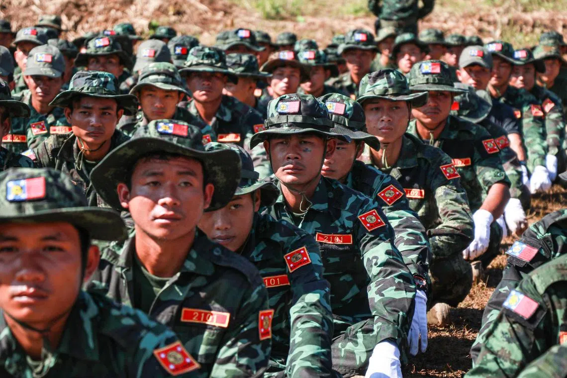 Soldiers of a Kayan ethnic rebel group fighting Myanmar’s junta line up during an event in Shan state.