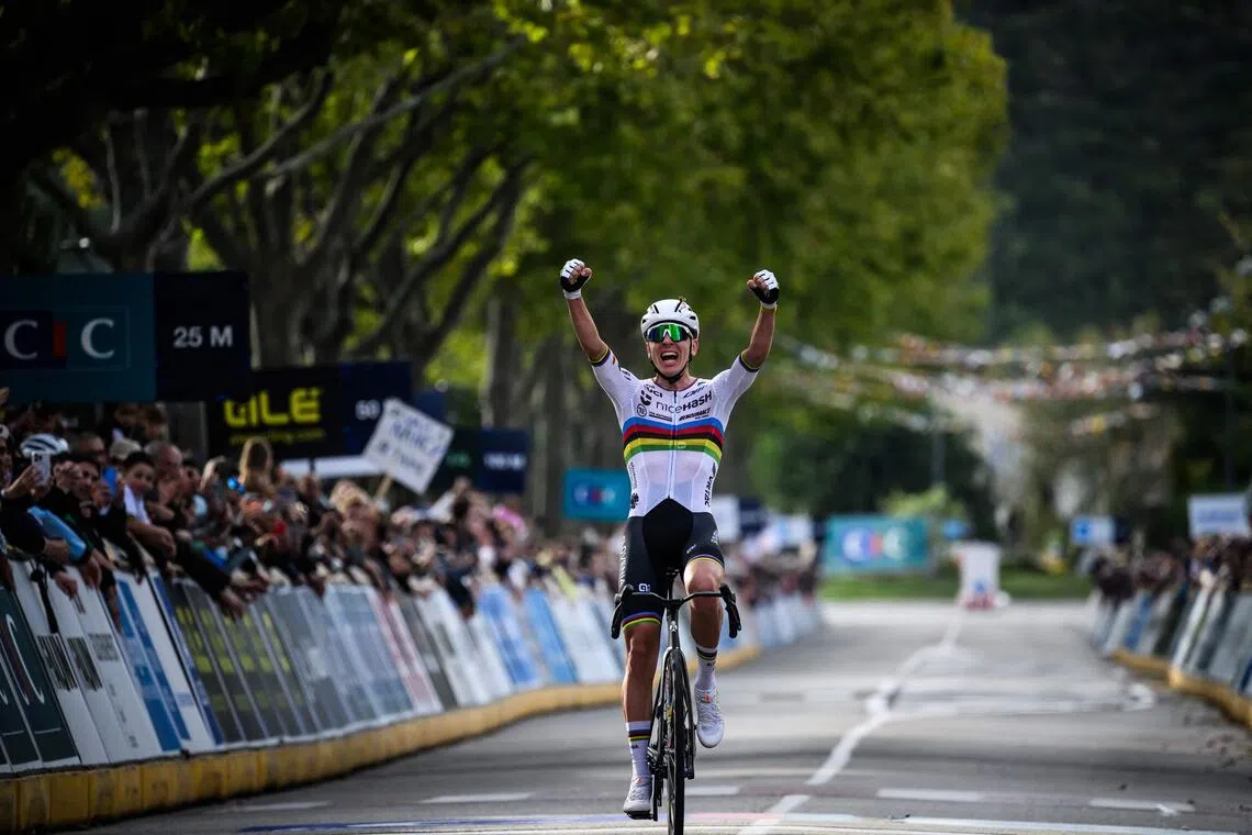Slovenian rider Tadej Pogacar celebrates as he wins the the men's Elite Road Race at the European Cycling Championship 2025 near Valence, southeastern France on October 5, 2025. (Photo by JEFF PACHOUD / AFP)
