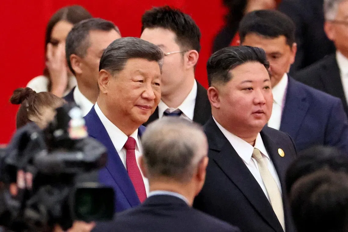 Chinese President Xi Jinping and North Korean leader Kim Jong Un arrive for a reception marking the 80th anniversary of the end of World War Two, at the Great Hall of the People in Beijing, China September 3, 2025. REUTERS/Florence Lo/File Photo