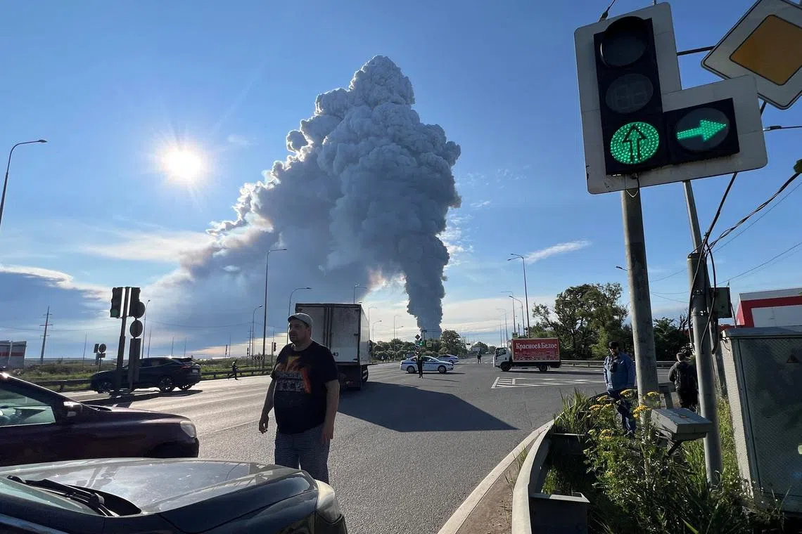 Smoke billows from the burning Wildberries warehouse following a Ukrainian drone attack, according to local authorities, in the course of the Russia-Ukraine conflict, in Saint Petersburg, Russia July 24, 2026. Picture taken with a mobile phone. REUTERS/Stringer