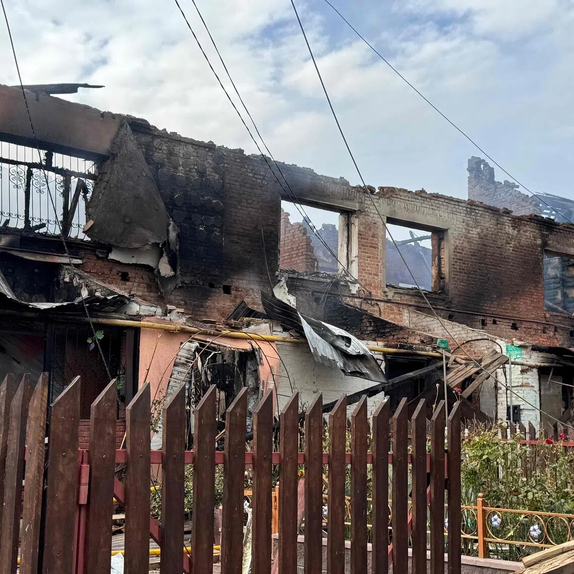 A damaged residential building following a Russian drone attack in Ukraine's Sumy region, which borders Russia.