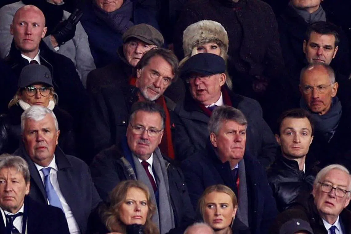 FILE PHOTO: Soccer Football - Premier League - Manchester United v Tottenham Hotspur - Old Trafford, Manchester, Britain - January 14, 2024 Manchester United co owner Jim Ratcliffe and former manager Alex Ferguson in the stands REUTERS/Carl Recine/File Photo