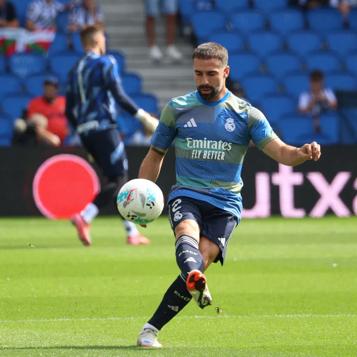 Soccer Football - LaLiga - Real Sociedad v Real Madrid - Reale Arena, San Sebastian, Spain - September 13, 2025 Real Madrid's Dani Carvajal during the warm up before the match REUTERS/Pankra Nieto