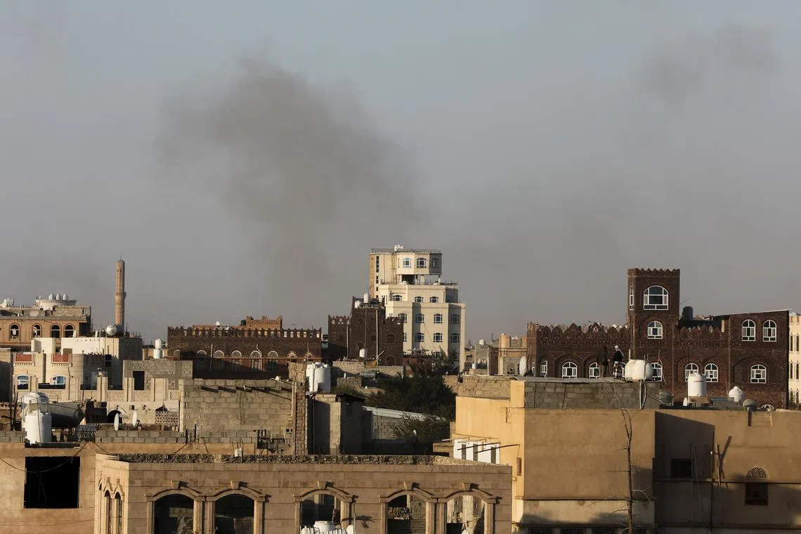 Smoke rises after Israeli strikes near Sanaa airport, in Sanaa, Yemen, December 26, 2024. REUTERS/Khaled Abdullah
