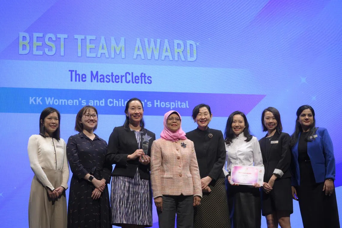 President Halimah Yacob and SingHealth CEO Ivy Ng (fourth from right) with the KKH team.