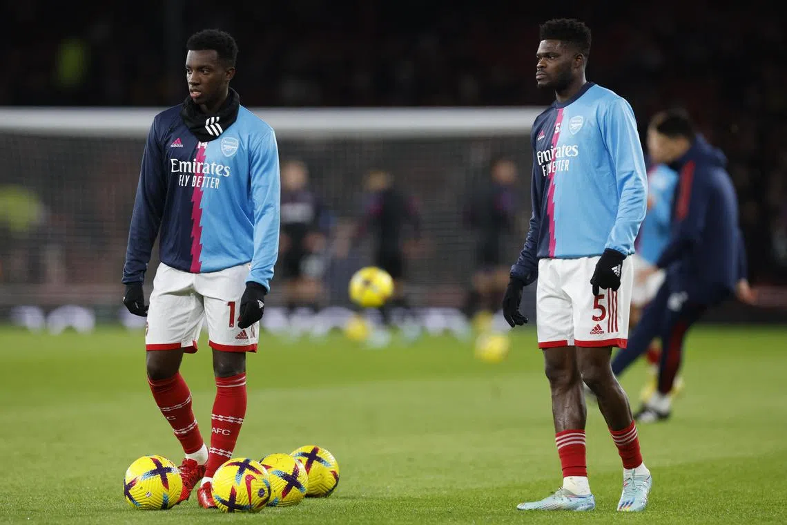 Arsenal's Eddie Nketiah and Thomas Partey during the warm up before the match against West Ham.