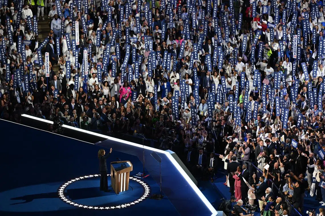 Democratic presidential nominee and U.S. Vice President Kamala Harris waves during Day 4 of the Democratic National Convention (DNC) at the United Center in Chicago, Illinois, U.S., August 22, 2024. REUTERS/Vincent Alban
