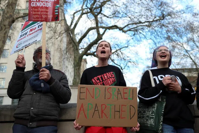 Pro-Palestinian activists protesting against Israel's new death penalty law for Palestinians convicted by military courts of deadly attacks, in London, Britain, on March 31.