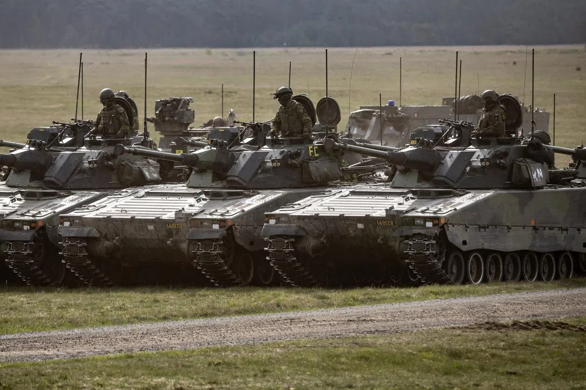 CV90 combat vehicles seen during the Aurora 23 military exercise at Rinkaby firing range outside Kristianstad, Sweden May 06, 2023. TT News Agency/Johan Nilsson via REUTERS/File Photo