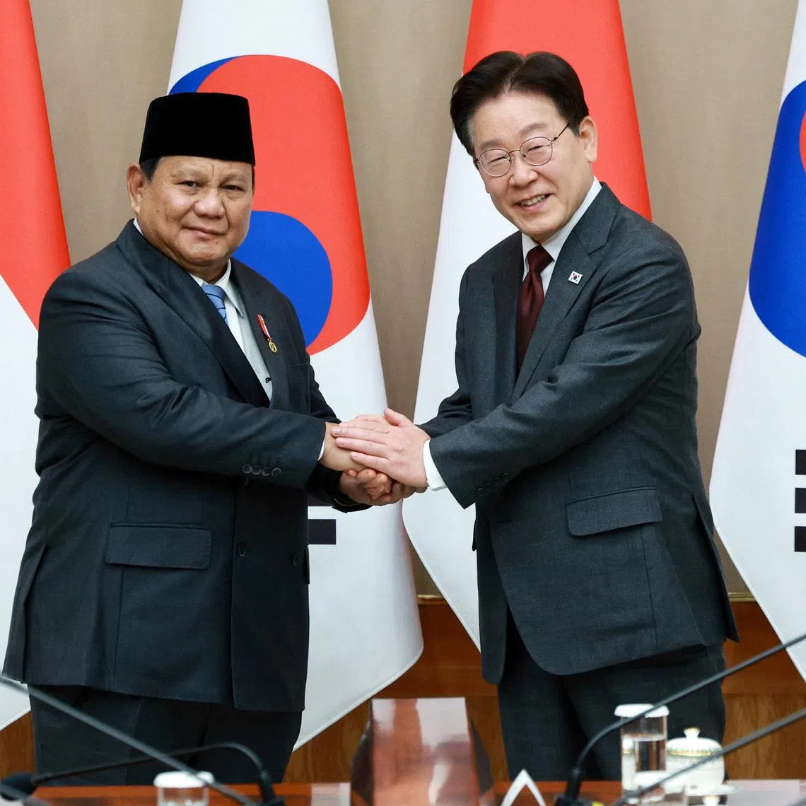 South Korean President Lee Jae Myung shakes hands with Indonesian President Prabowo Subianto during their meeting at the Presidential Blue House in Seoul, South Korea, April 1, 2026. Yonhap via REUTERS