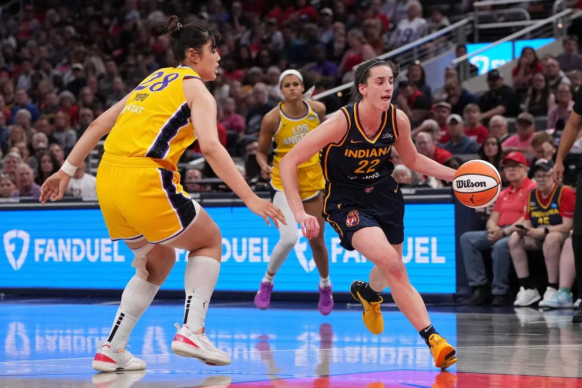 Caitlin Clark collected 24 points, 10 rebounds and 10 assists to help lift the Indiana Fever to a 93-86 victory over the Los Angeles Sparks in Indianapolis on Sept 4.