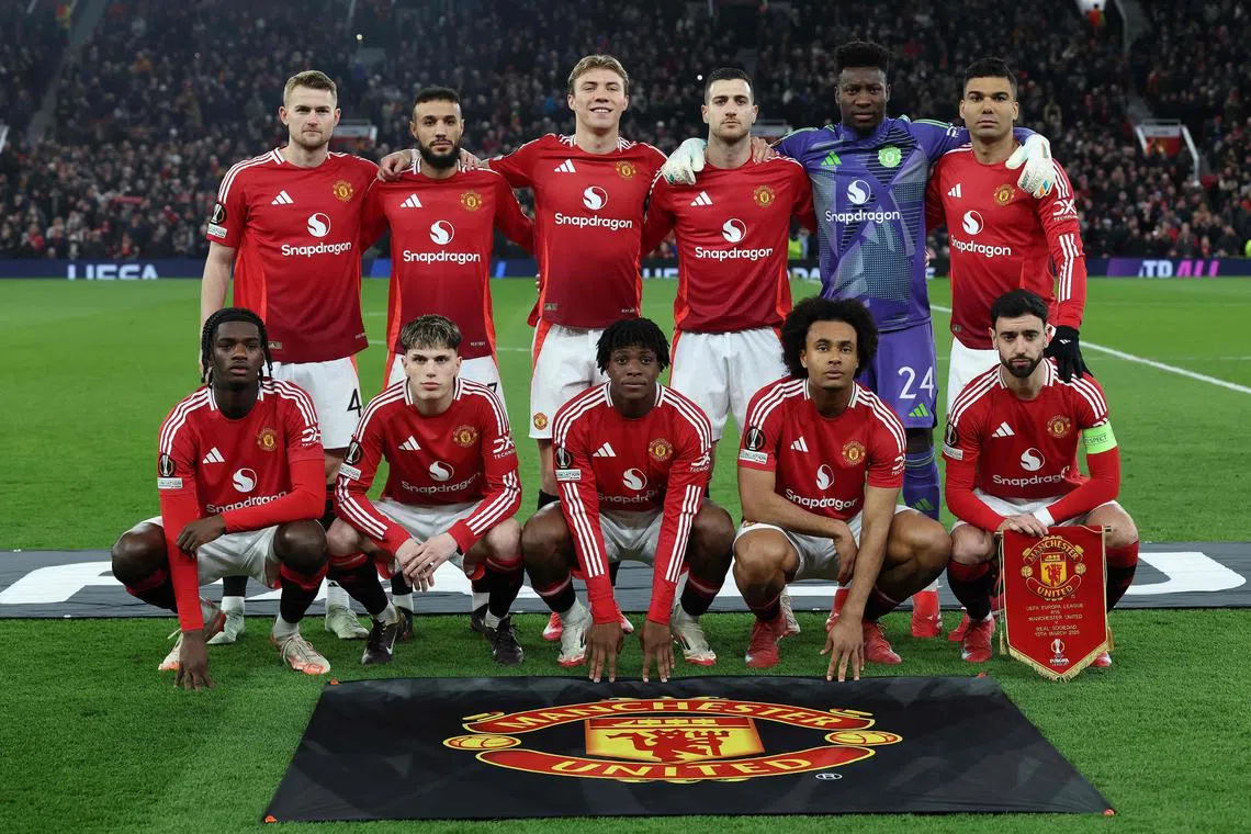 The current Manchester United team before a Europa League match against Real Sociedad at Old Trafford.