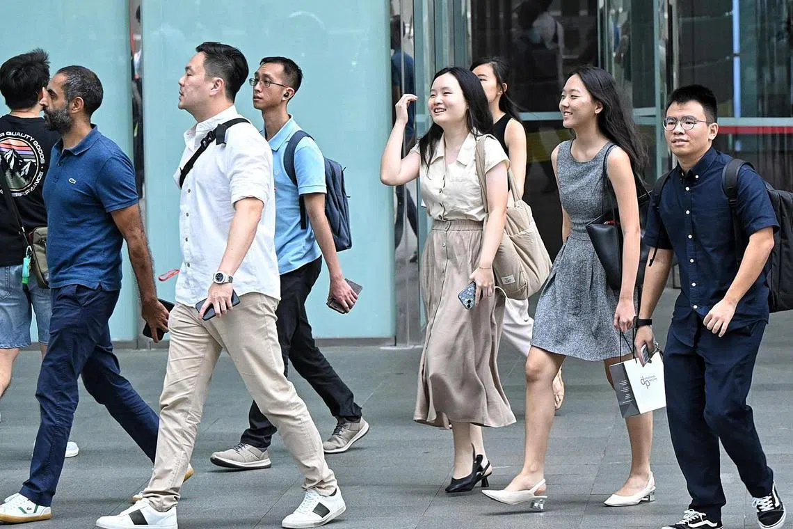 Pixgeneric / Generic pix of office workers at Raffles Place ( CBD) in Singapore on March 14, 2024.
