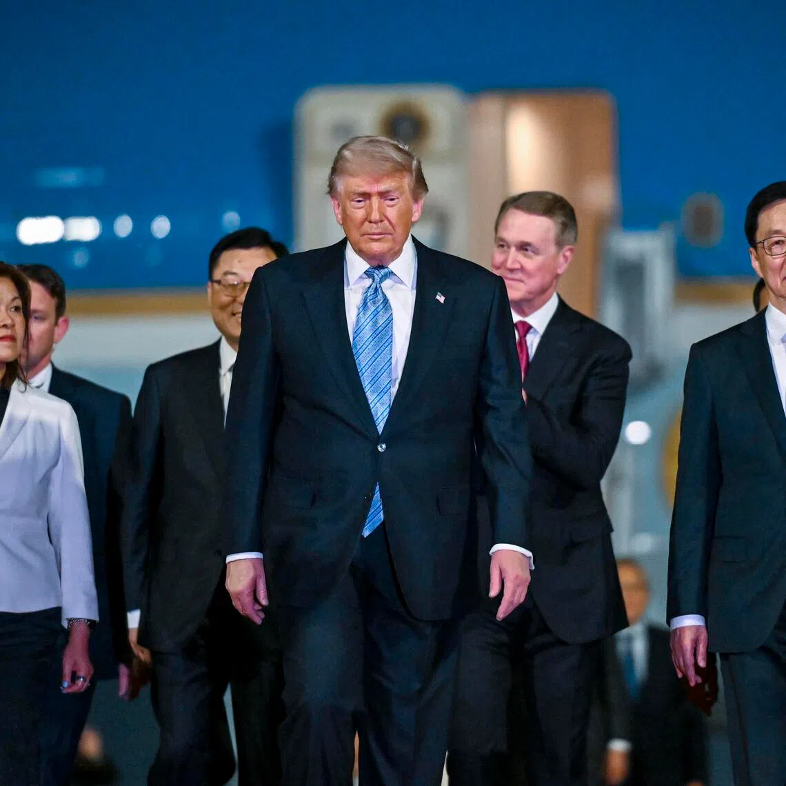 US President Donald Trump (centre) arriving in Beijing, China, on May 13, ahead of talks with Chinese President Xi Jinping. He is expected to ask for China’s help to resolve the Iran war.