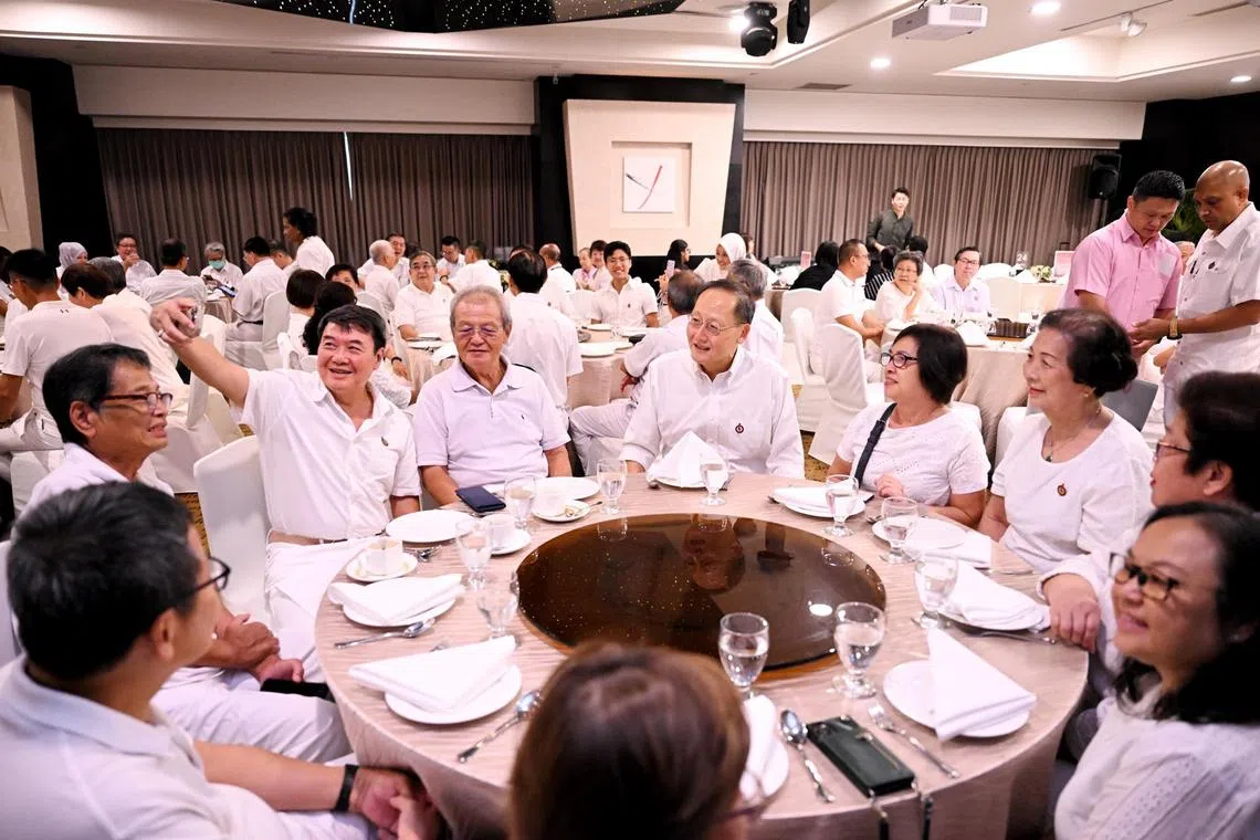 (From left) Dr Tan See Leng, chairman of People’s Action Party’s Seniors Group (PAPSG), interacts with crowd during a commemorative event for International Day of Older Persons (IDOP) on Sept 23. 


ST Photo: AZMI ATHNI