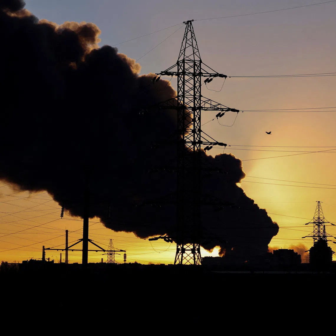 Smoke rising over the city after Russian missile and drone strikes in Lviv, Ukraine, on Nov 19.