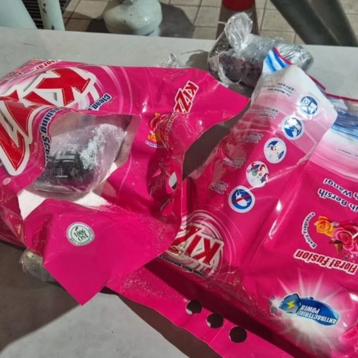On Feb 6, officers found two packages labelled as laundry detergent powder that contained the two vapes and over 200 Kpods.