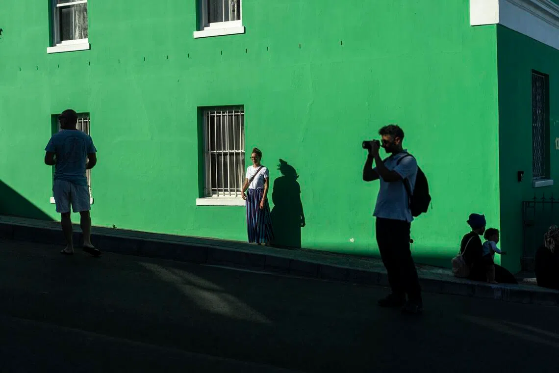Bo-Kaap, a historical area of Cape Town, is a popular tourist destination where some houses have been bought by foreigners, and others have been turned into vacation rentals.