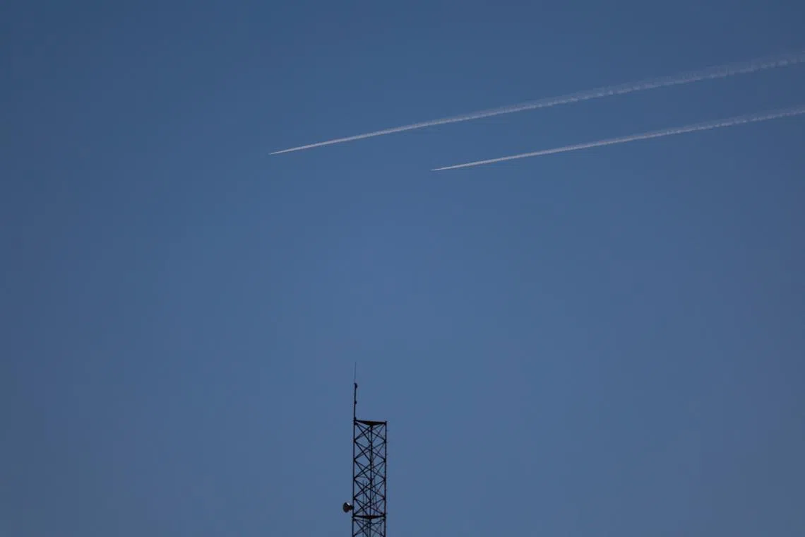 Israeli planes fly over Syria, as seen from the Israeli-occupied Golan Heights, December 9, 2024. REUTERS/Ammar Awad
