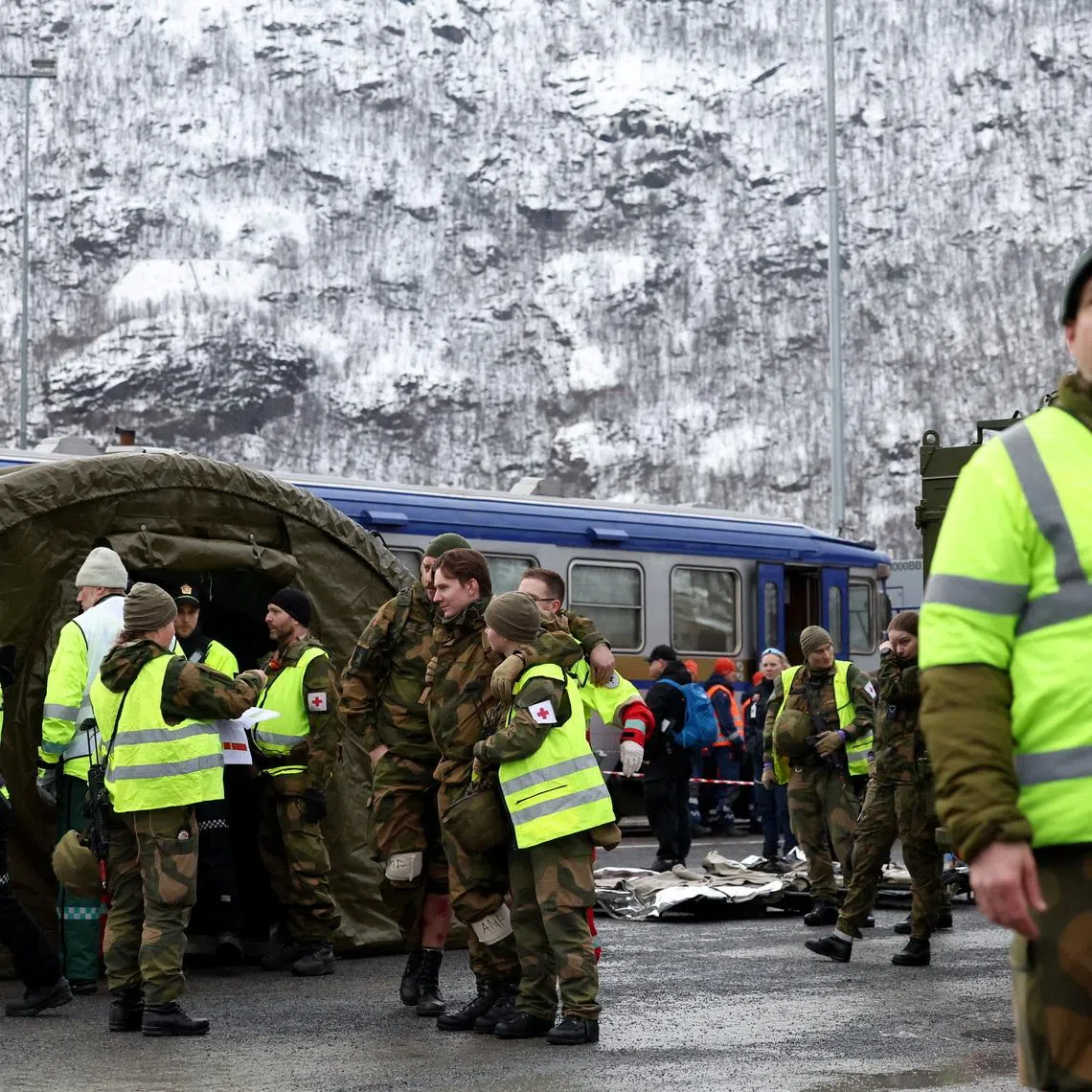 Soldiers and civilian health personnel take part in a healthcare drill during the NATO Cold Response 2026 military exercise in Narvik, Norway, March 12, 2026. REUTERS/Bernadett Szabo