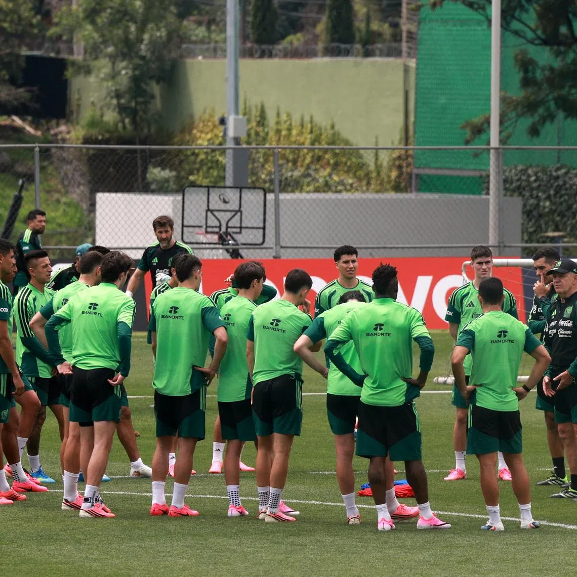 Soccer Football - FIFA World Cup 2026 - Mexico Training - Centro de Alto Rendimiento, Mexico City, Mexico - June 6, 2026 Mexico coach Javier Aguirre and assistant coach Rafael Marquez with players during training REUTERS/Henry Romero