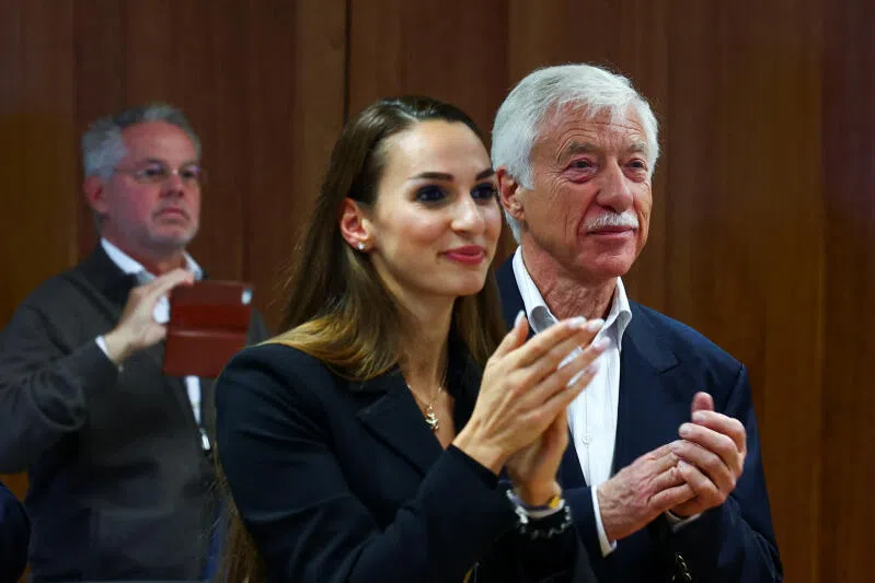 Candidate for Gelsenkirchen mayor from Germany's far-right Alternative for Germany party Norbert Emmerich (right), and Ms Enxhi Seli-Zacharias of AfD react to the exit polls for the North Rhine-Westphalian local elections.