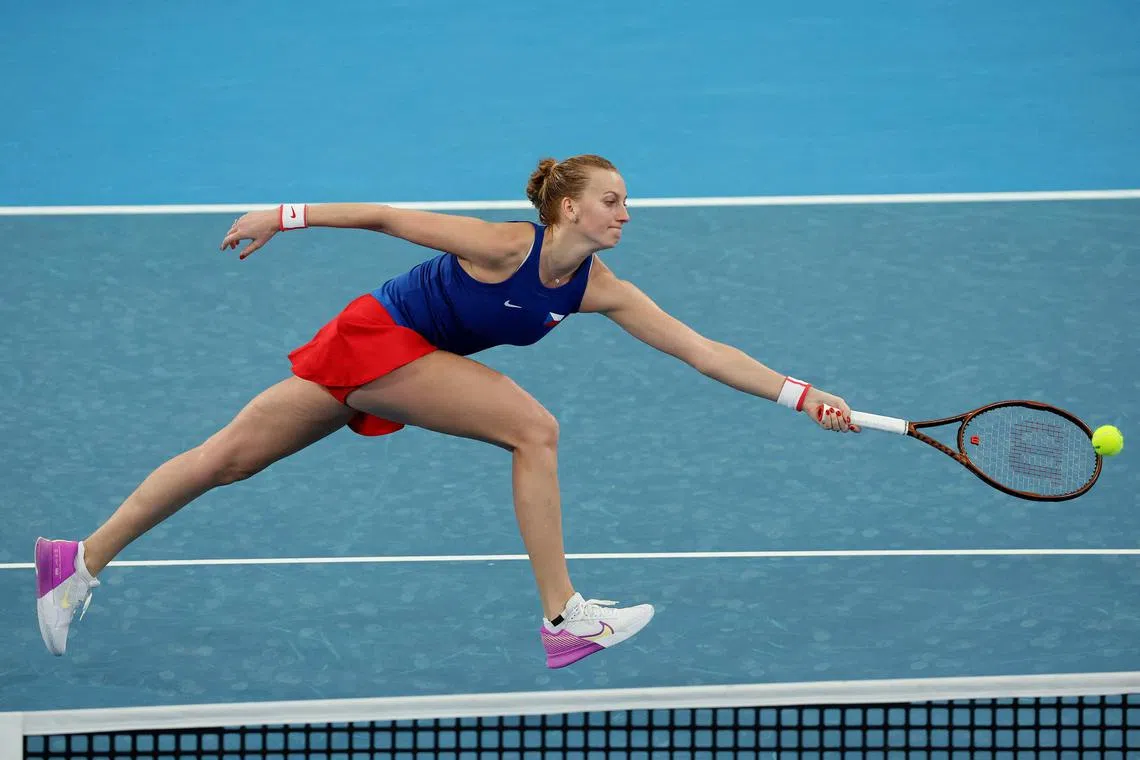 Czech Republic's Petra Kvitova hits a return against American Jessica Pegula during their singles match at the United Cup.