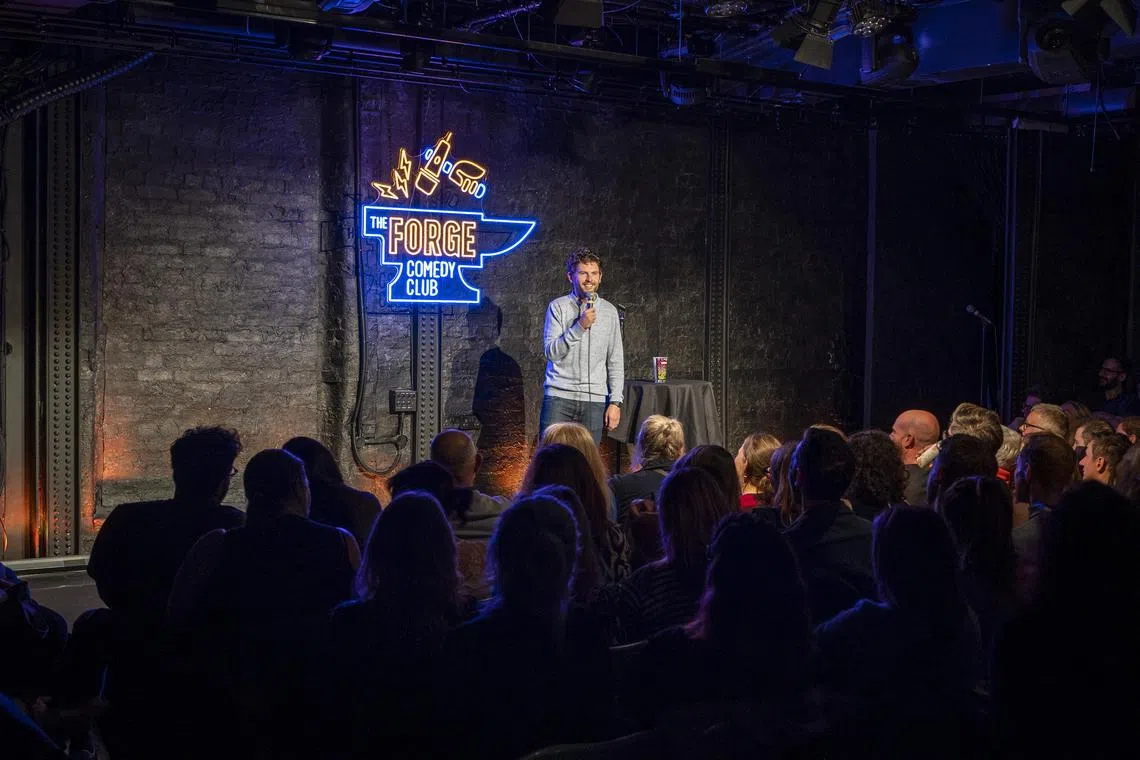 George Lewis, a bard of British parenting comedy, performs in Brighton, England on Nov 14, 2024. 