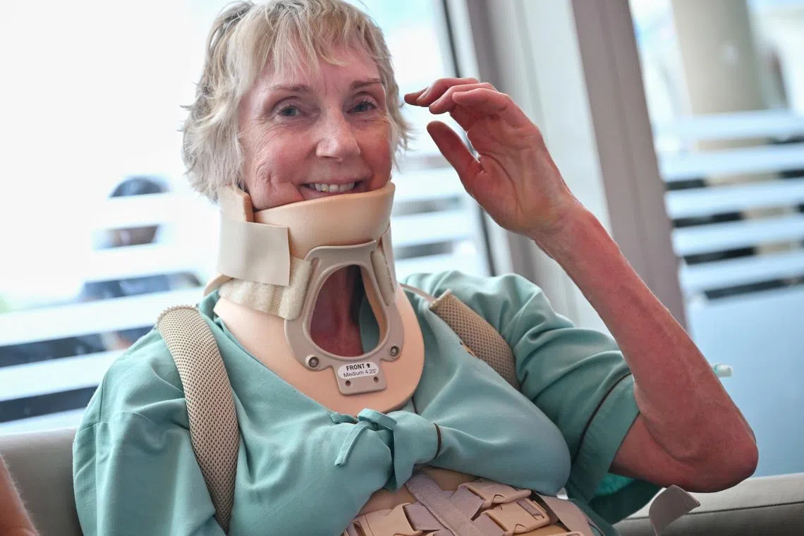 Ms Karen Archer cracked three small spinal bones during the turbulence that hit Flight SQ321.