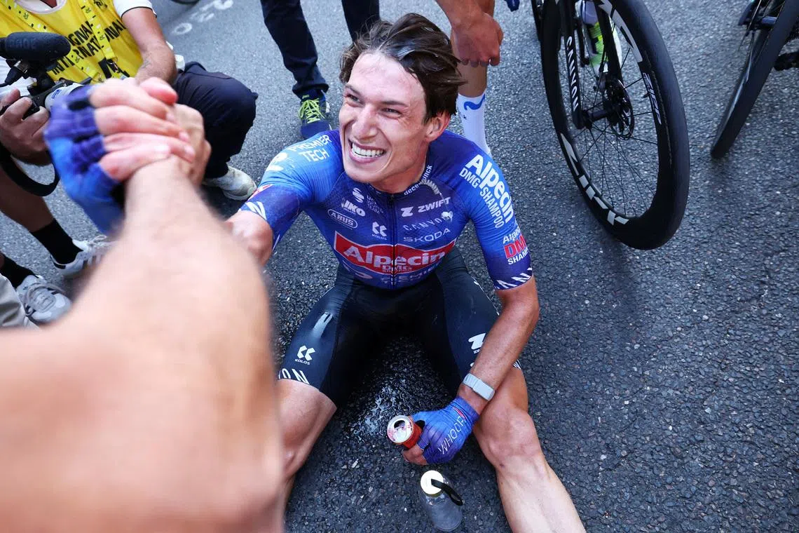 Cycling - Tour de France - Stage 17 - Chambery to Voiron - Voiron , France - July 22, 2026 Alpecin - Premier Tech's Jasper Philipsen celebrates after winning stage 17 REUTERS/Gonzalo Fuentes/Pool