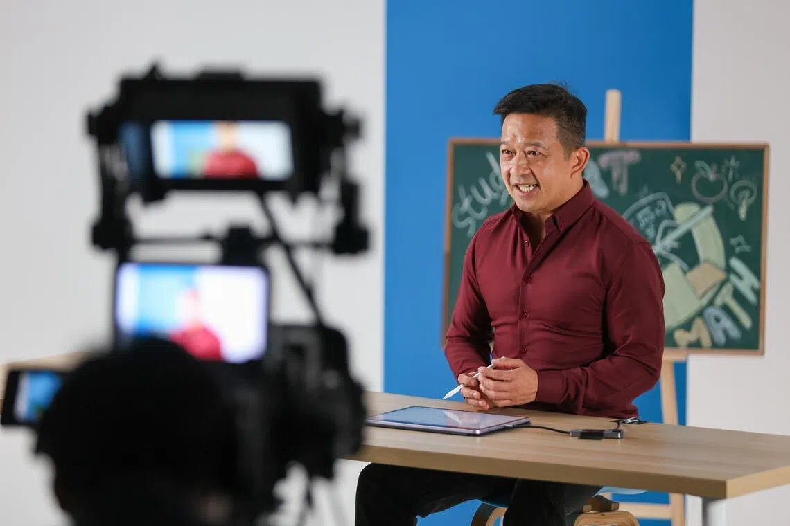 ST20260324_202628400132/Jasel Poh/ecmath

Maths Expert Dr Yeap Ban Har demonstrating the solutions to tricky math problems at the recording of the ST PSLE Companion video series on March 24, 2026.