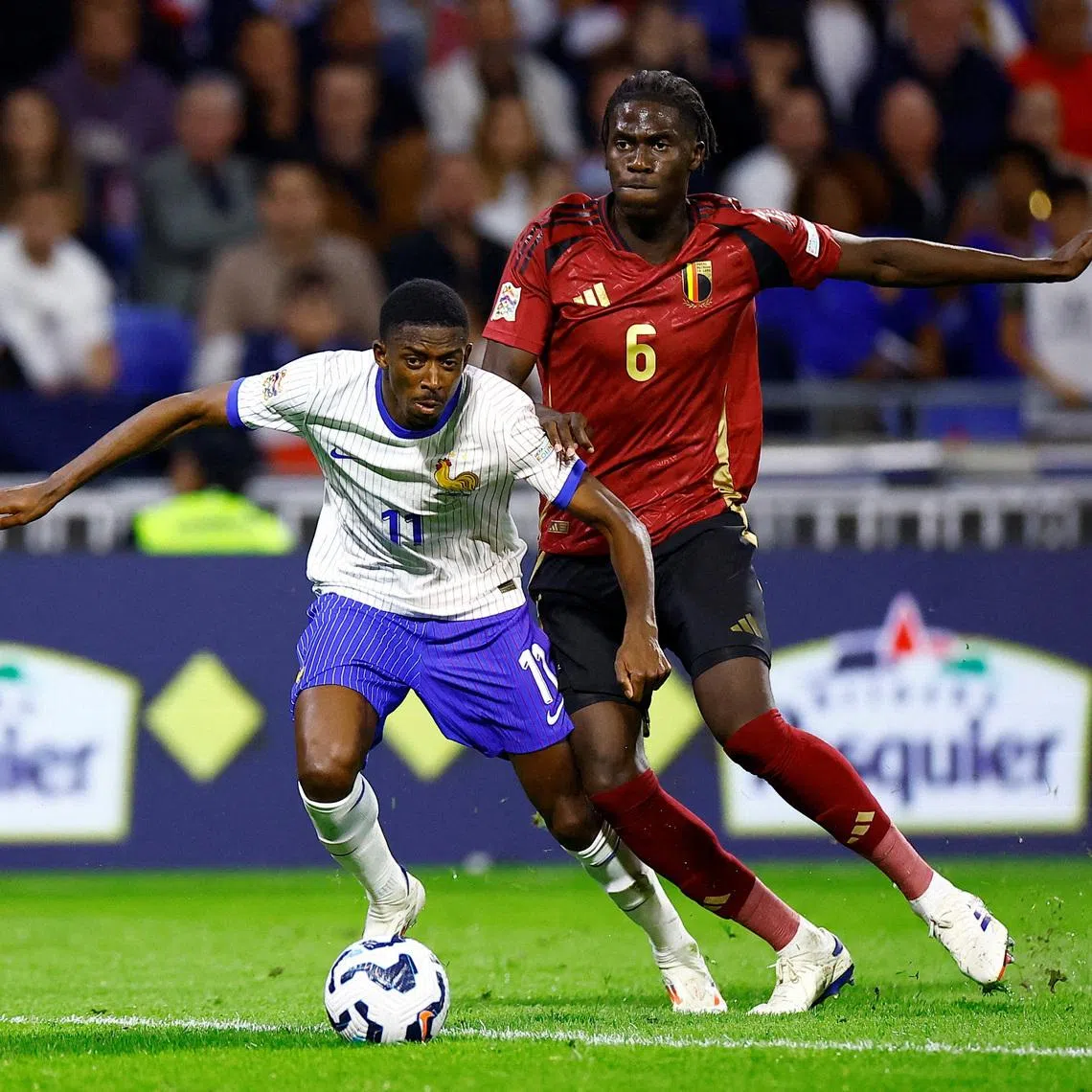 FILE PHOTO: Soccer Football - Nations League - League A - Group 2 - France v Belgium - Groupama Stadium, Lyon, France - September 9, 2024 France's Ousmane Dembele in action with Belgium's Amadou Onana REUTERS/Sarah Meyssonnier/File Photo