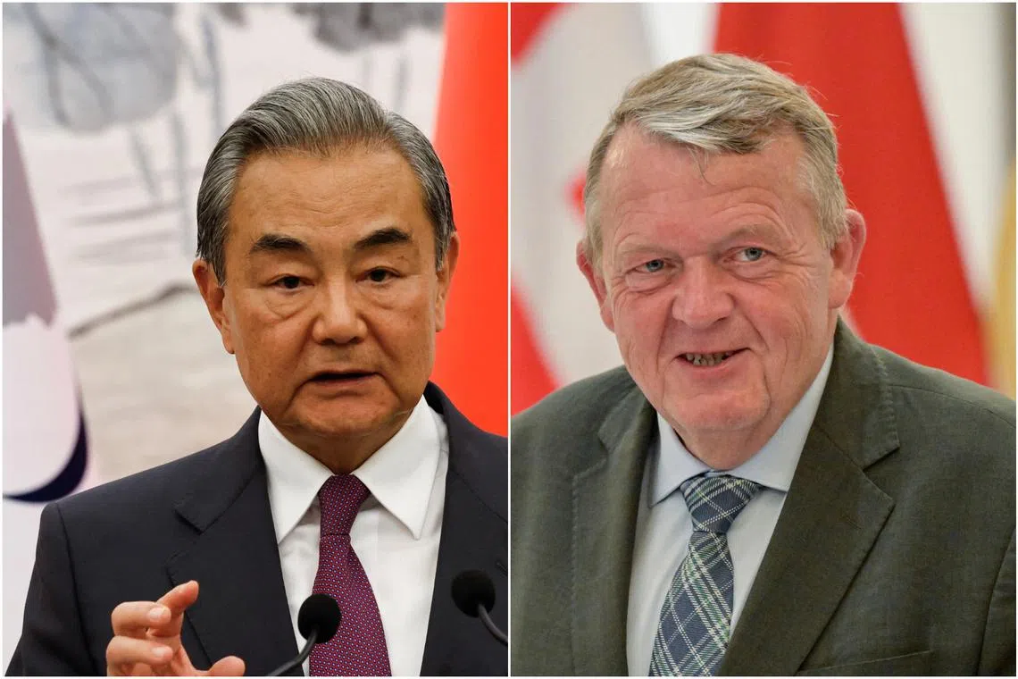Chinese Foreign Minister Wang Yi (left) told his Danish counterpart Mr Lars Lokke Rasmussen that China fully respects Denmark's sovereignty. 