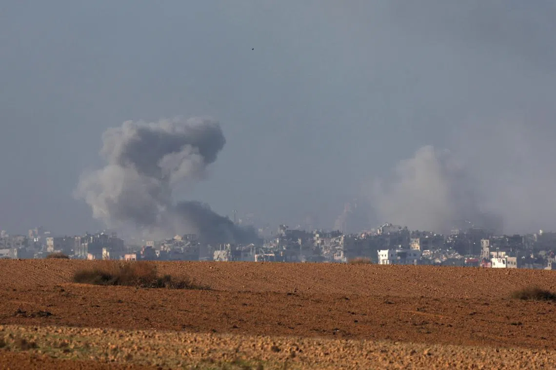 Smoke rises after an explosion in the northern part of the Gaza Strip, as seen from Be'eri, southern Israel.