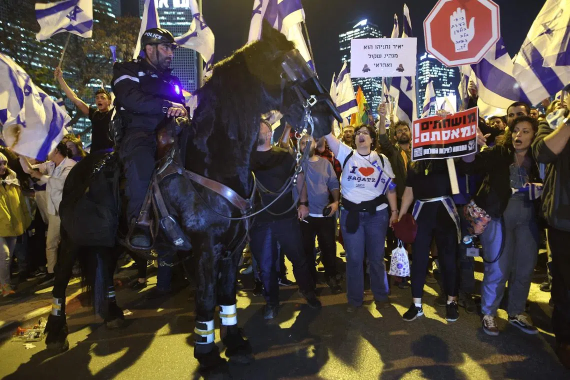 Protesters during ongoing demonstrations in Tel Aviv on March 27, 2023. 