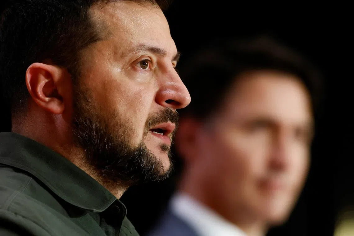 FILE PHOTO: Ukraine's President Volodymyr Zelenskiy speaks, as he attends a joint press conference with Canadian Prime Minister Justin Trudeau in Ottawa, Ontario, Canada September 22, 2023. REUTERS/Blair Gable/File Photo