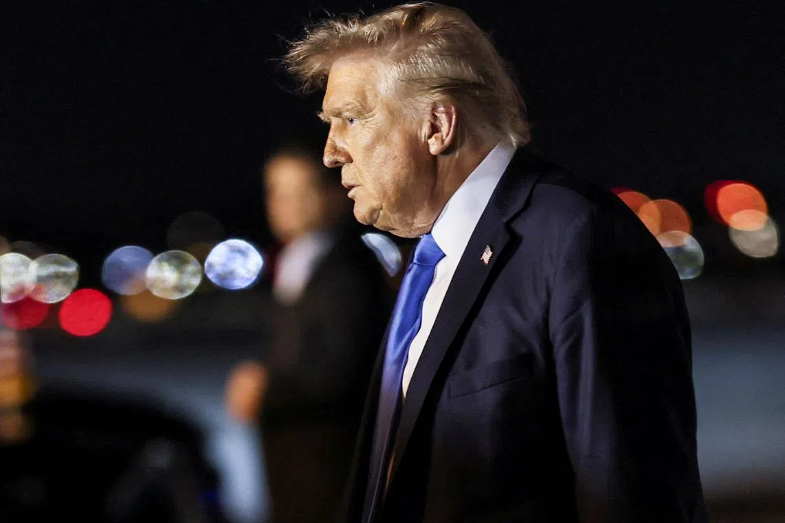 FILE PHOTO: U.S. President Donald Trump walks after disembarking from Air Force One at Palm Beach International Airport, West Palm Beach, Florida, U.S. May 1, 2025. REUTERS/Leah Millis/File Photo