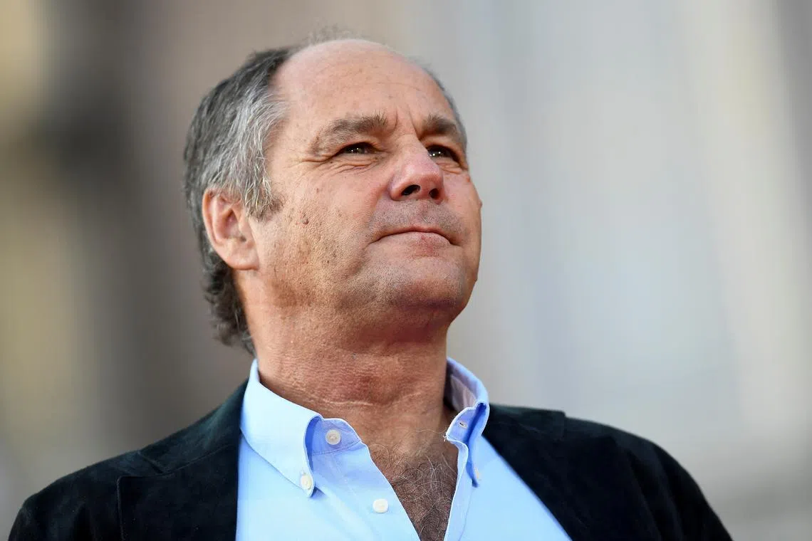 Former Formula One driver Gerhard Berger attends an event to celebrate 90 years of Italian premium sports car maker Ferrari racing team at Milan's Duomo square, in Milan, Italy September 4, 2019. REUTERS/Flavio lo Scalzo/File Photo