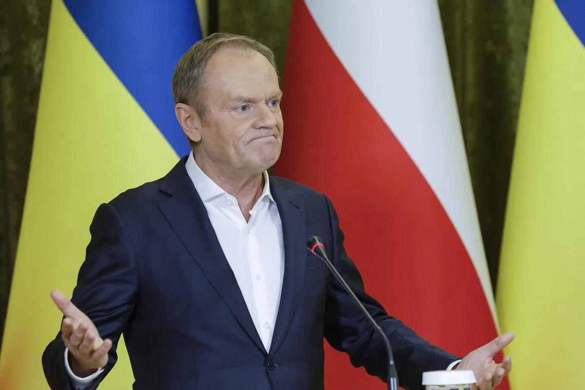 Polish Prime Minister Donald Tusk addresses a media conference during a visit earlier in January to Ukraine's capital, Kyiv.