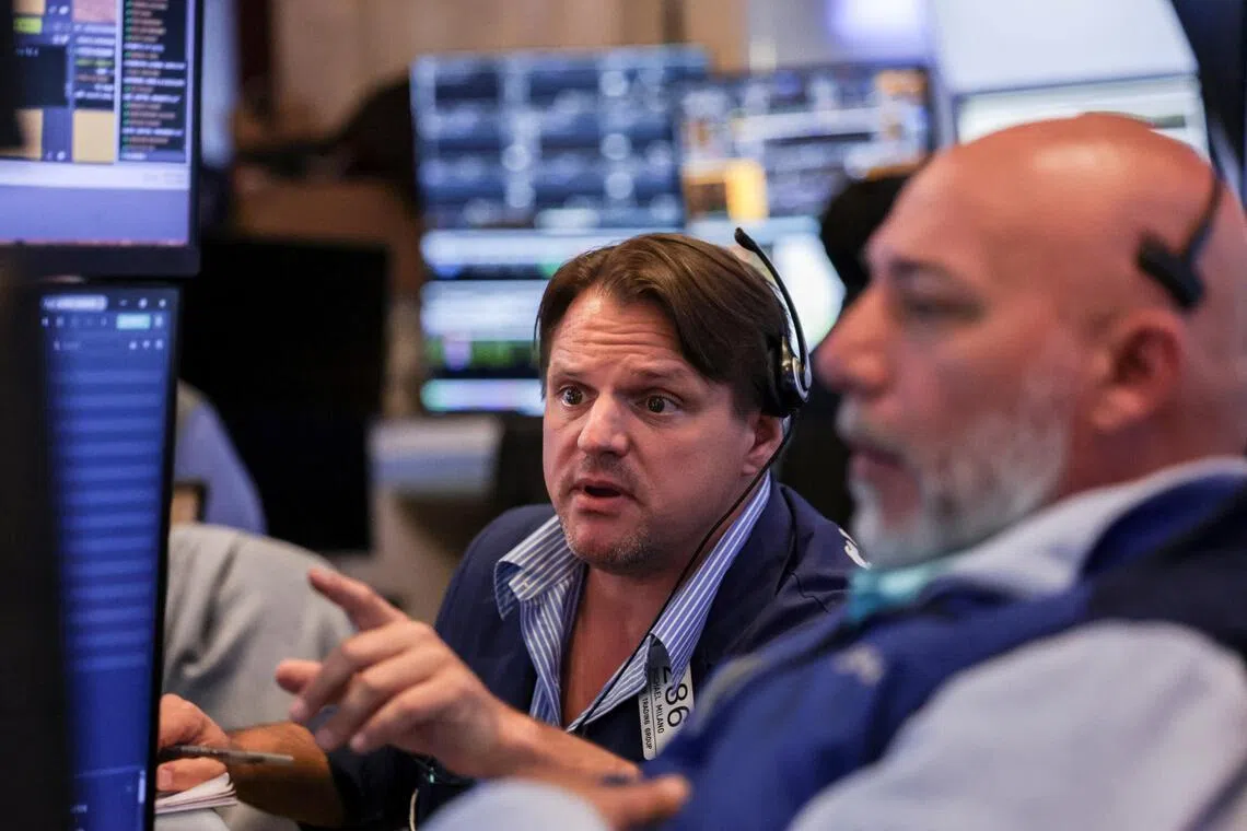 Traders working on the floor of the New York Stock Exchange, in New York City, on May 21.