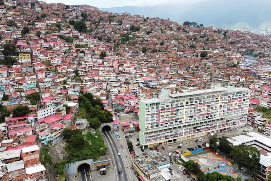 An aerial view shows the El Valle neighborhood, a day before Venezuela elects a unity candidate to represent the country's opposition in the 2024 presidential elections, in Caracas, Venezuela October 21, 2023. REUTERS/Leonardo Fernandez Viloria